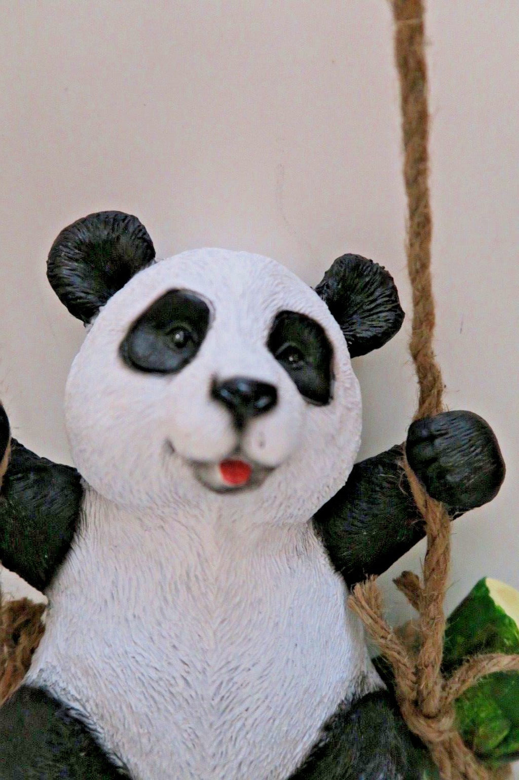 HANGING PANDA ON LOG  GARDEN STATUE