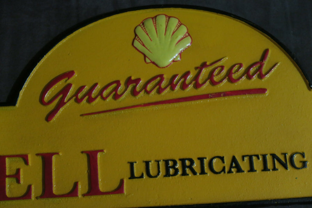 Guaranteed Shell Lubricating Oil Cast Iron Sign Plaque Man Cave Garage