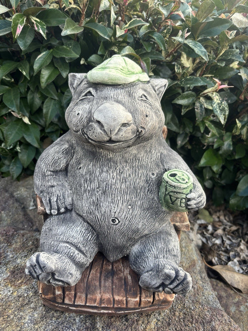 Australian Made Concrete Wombat Relaxing in Chair with a VB Garden Statue