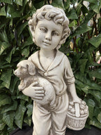 BOY STANDING HOLDING HIS PUPPY DOG GARDEN STATUE ORNAMENT FIGURINE