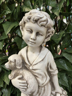 BOY STANDING HOLDING HIS PUPPY DOG GARDEN STATUE ORNAMENT FIGURINE