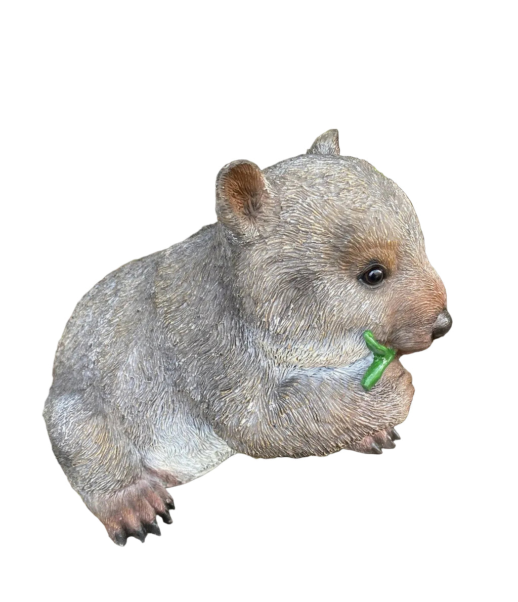 AUSTRALIAN WOMBAT EATING A LEAF GARDEN STATUE
