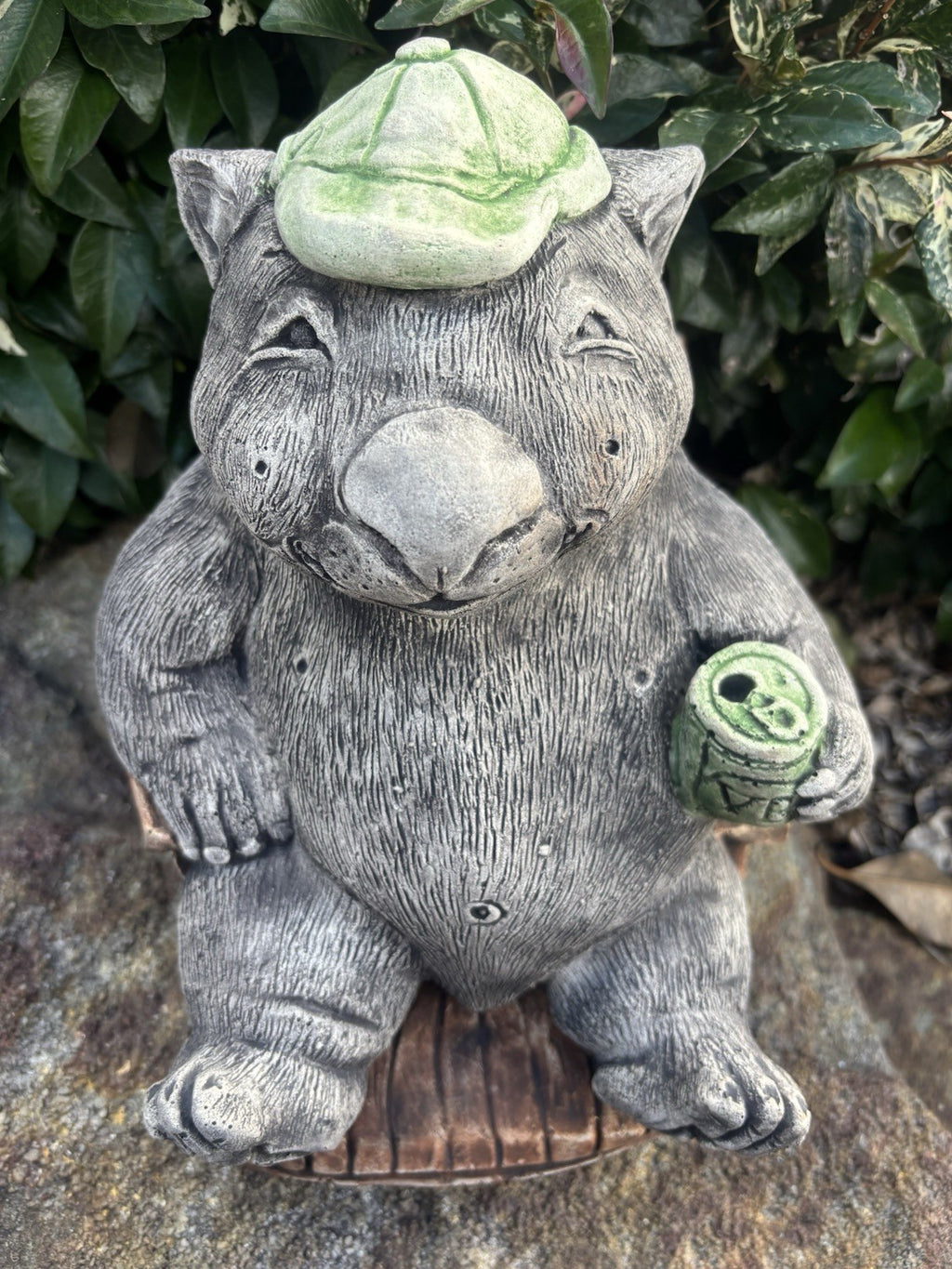 Australian Made Concrete Wombat Relaxing in Chair with a VB Garden Statue