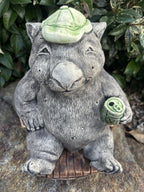 Australian Made Concrete Wombat Relaxing in Chair with a VB Garden Statue