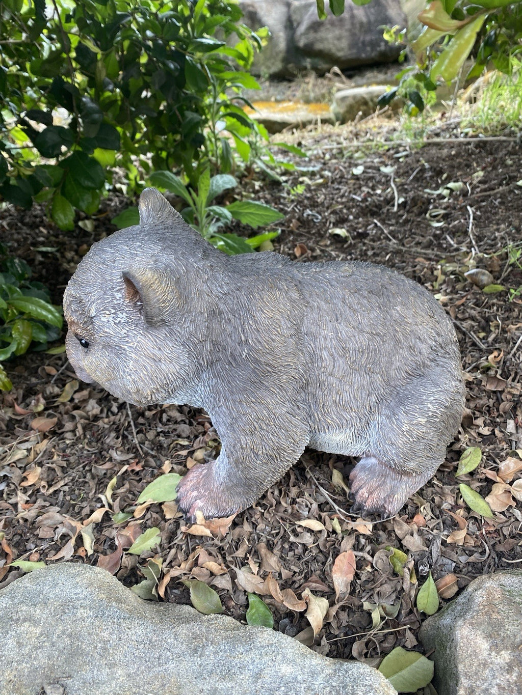 AUSTRALIAN WOMBAT EATING A LEAF GARDEN STATUE