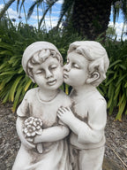 Boy And Girl Sharing A Kiss Garden Statue