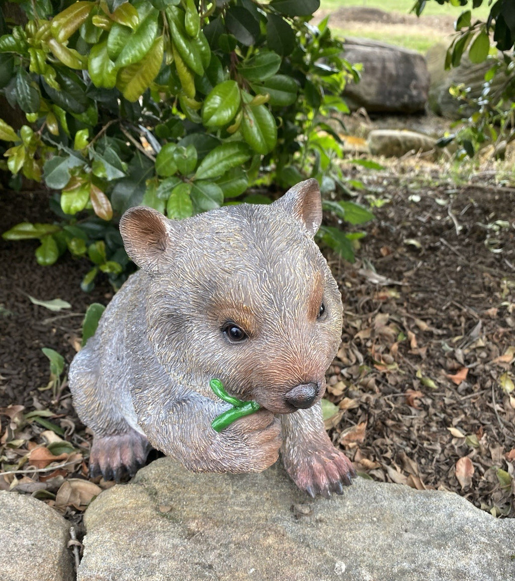 AUSTRALIAN WOMBAT EATING A LEAF GARDEN STATUE