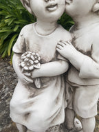 Boy And Girl Sharing A Kiss Garden Statue