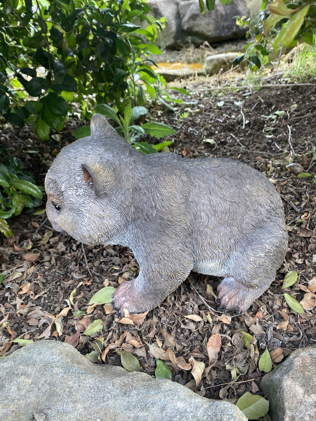 AUSTRALIAN WOMBAT EATING A LEAF GARDEN STATUE