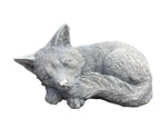 sleeping fox concrete garden statue displayed in a landscaped Australian garden 