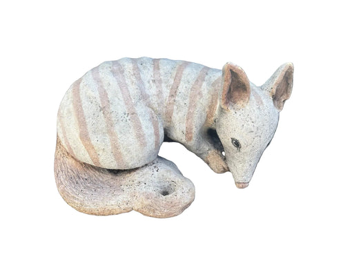 Australian Made Concrete Numbat Garden Statue displayed in a landscaped Australian garden.