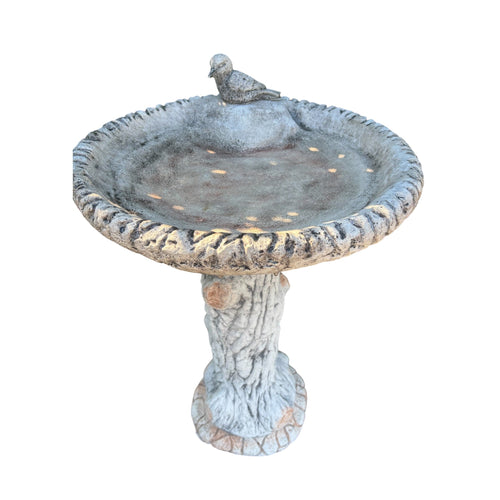  grey concrete bird bath featuring a detailed kookaburra perched on a tree trunk pedestal.