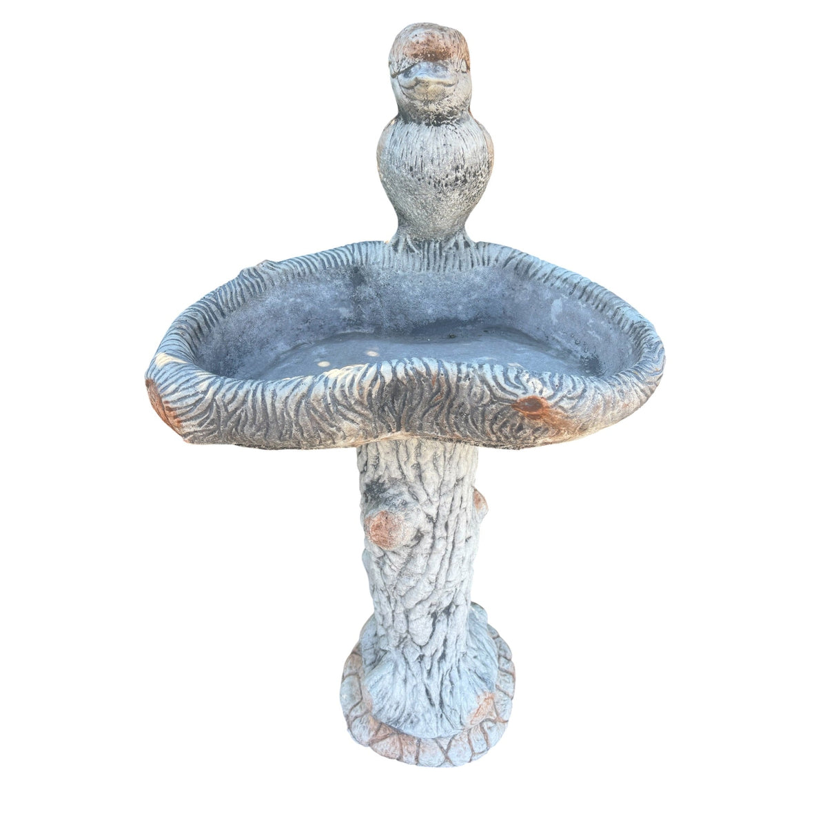 large concrete bird bath with a detailed kookaburra figure on a rustic tree-style pedestal