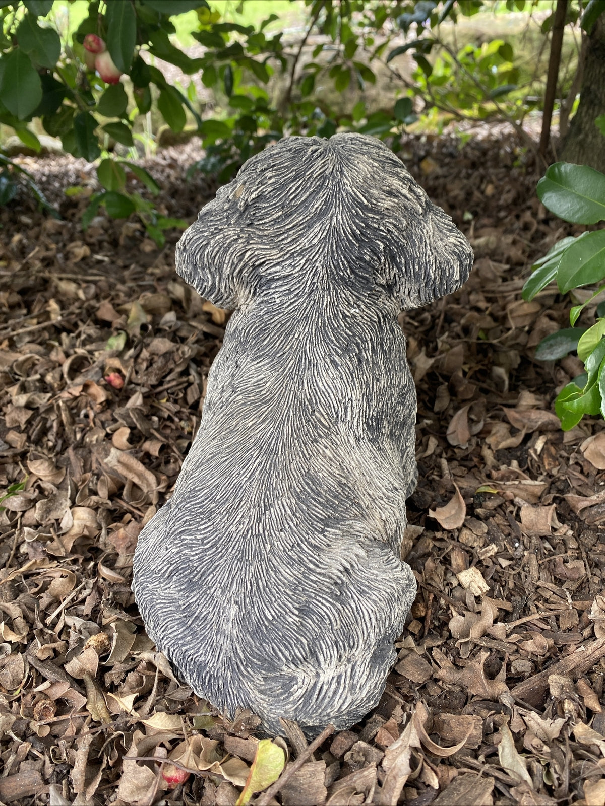 Back view of concrete maltese garden statue solid cement outdoor ornament