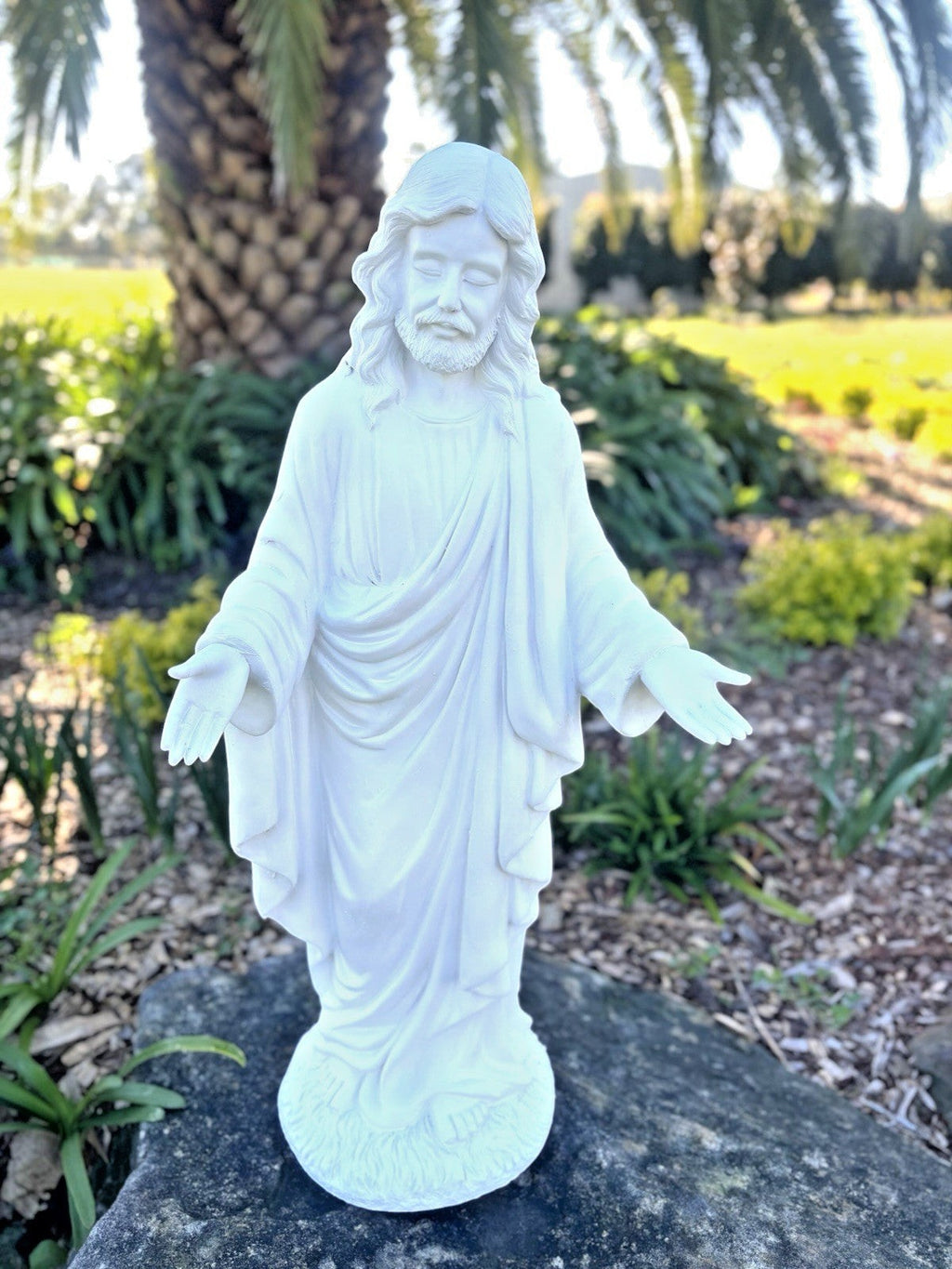 22nice4me Garden Statues 75cm white fibreclay resin Jesus statue standing in a serene outdoor garden setting