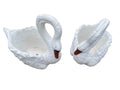 White Swan concrete planter filled with colourful flowers in an outdoor garden
